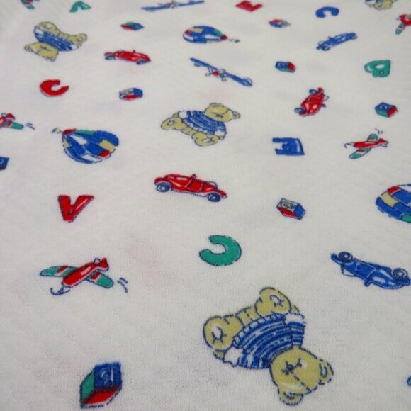Fabric Toys Quilted Double Knit (extra warm) 60x72" (white background) yardage - Picture 1 of 4